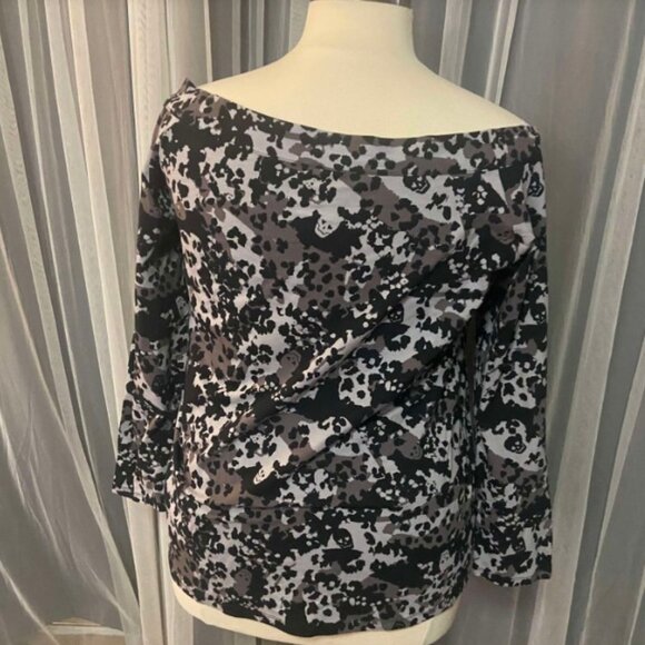 Torrid size 4LoveSick Cold Shoulder Keyhole Tee - Super Soft Black Hiding Skulls - Picture 9 of 10